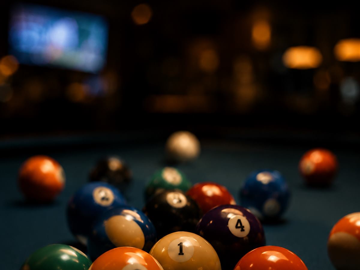 League night players around a table with a chalkboard scoreboard